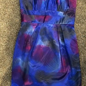 Sleeveless cocktail dress. Great side boning.